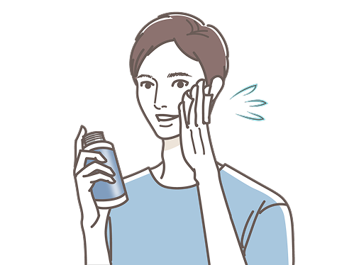男性が化粧水を使用している