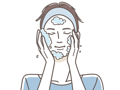 男性が洗顔をしている